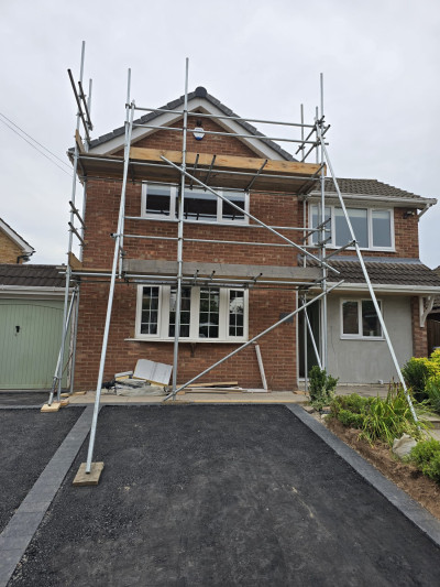 Scaffolding erected at front gable wall of UK house in Nottingham | East Midlands