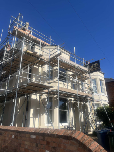 Scaffolding erected at the front of old style UK house in Nottingham | East Midlands